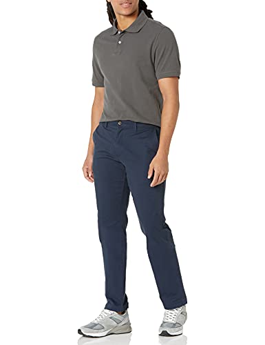 Amazon Essentials - Pantalones ajustados informales en color caqui para hombre, Azul (Navy), W33/L32